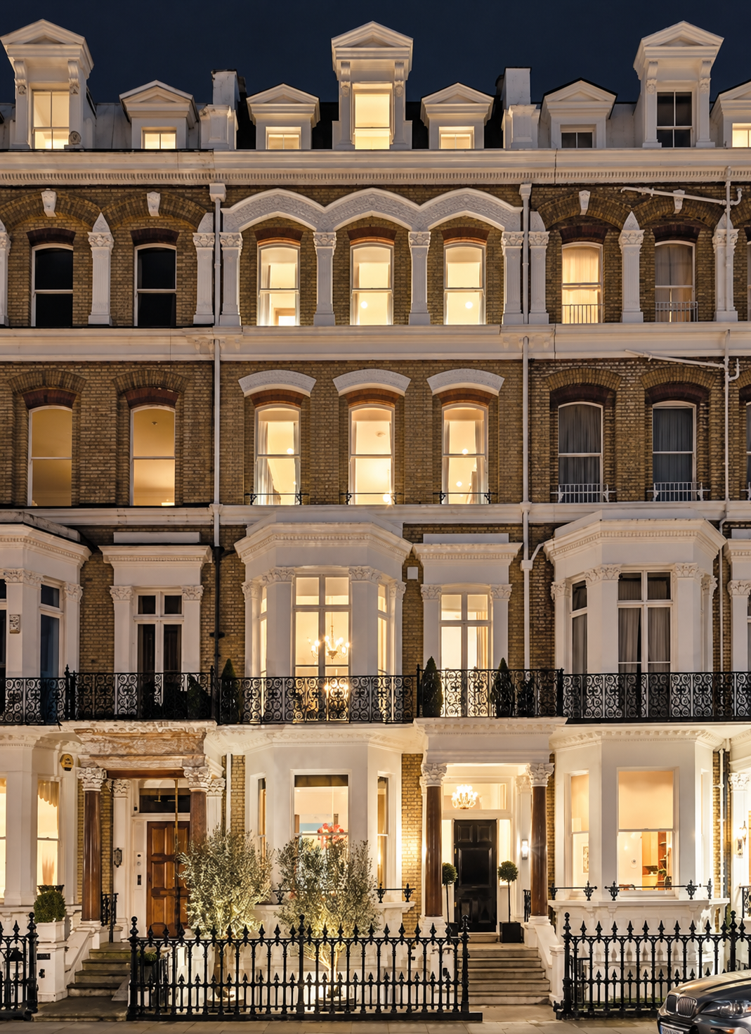 Victorian residential property with illuminated entrances and traditional brickwork